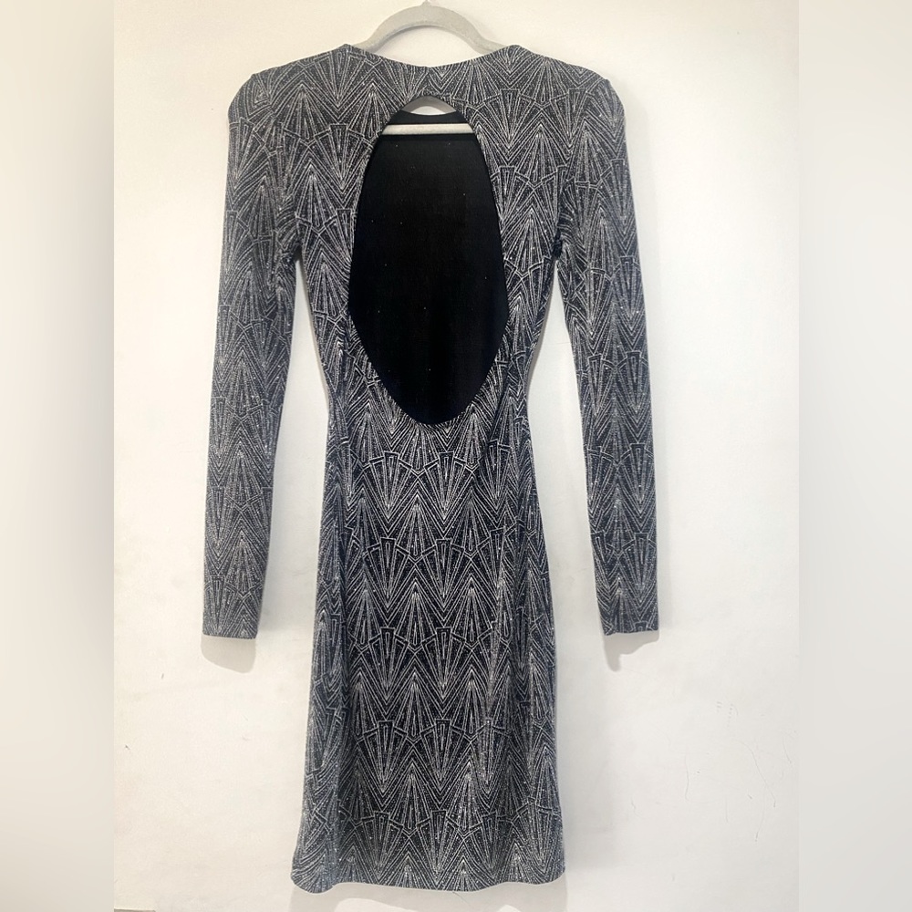 Sparkly back less black stretchy cocktail dress.
